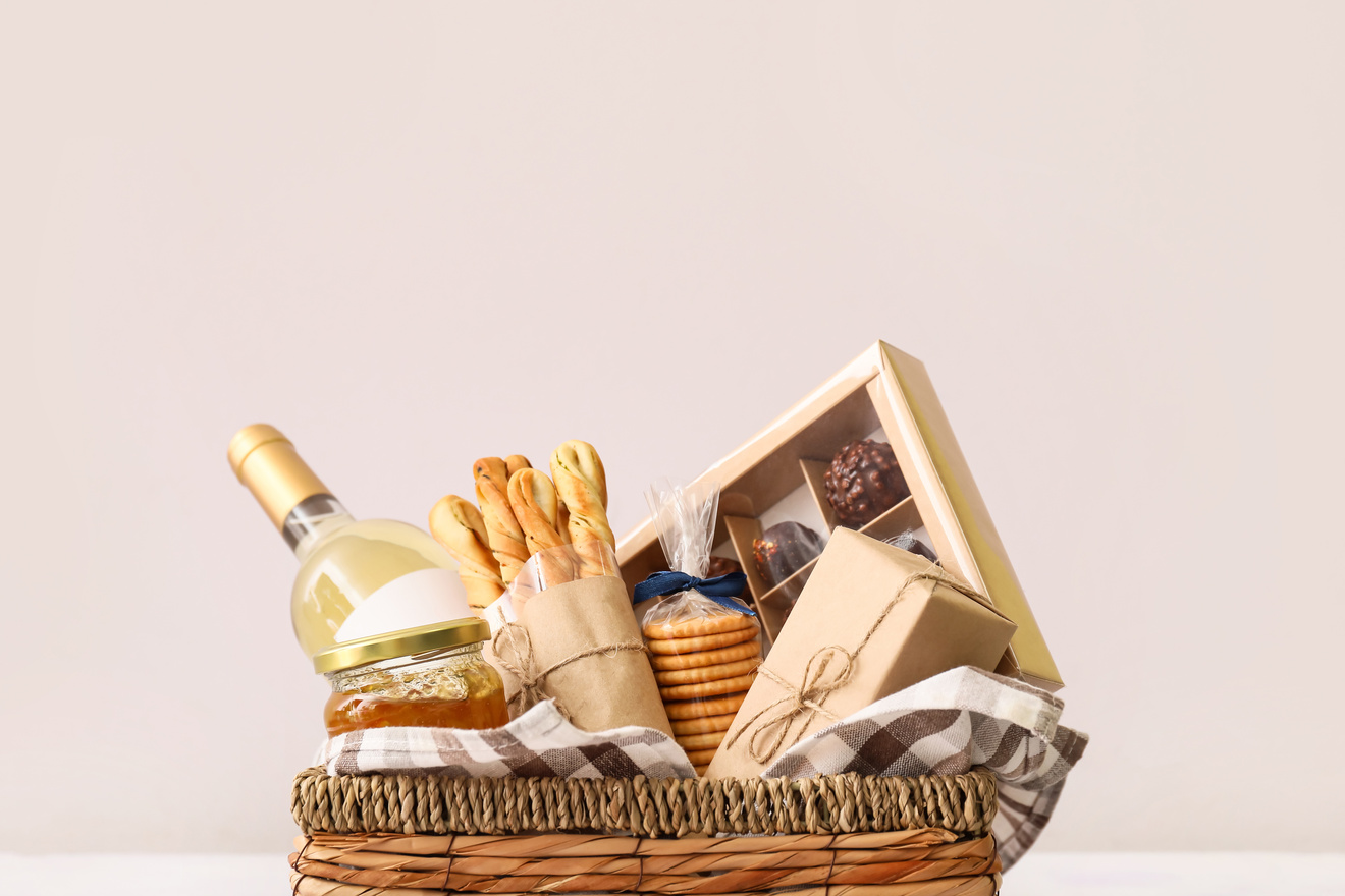 Gift Basket with Products on Light Background